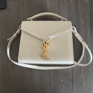 Saint Laurent CASSANDRA MINI TOP HANDLE BAG IN GRAIN DE POUDRE EMBOSSED LEATHER